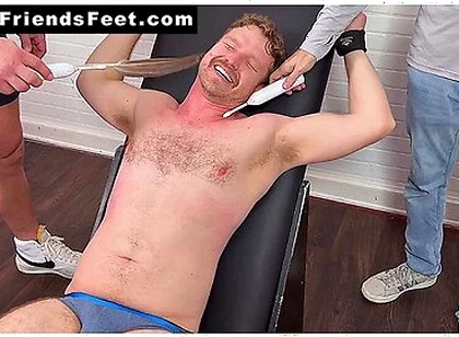 Russ Laughs Hard While His Doms Dan And Girth Tickle His Big Feet