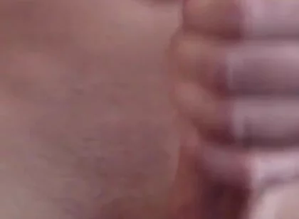 Masturbating