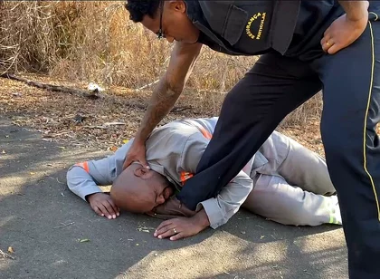 Vigilante Humiliating the Worker