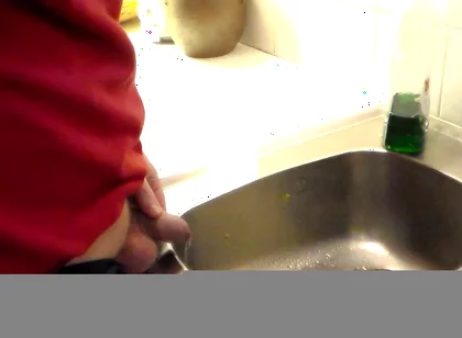 John Is Pissing in the Kitchen Sink