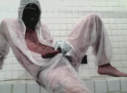 Masked Femboy in Suit Pees Itself and Cums