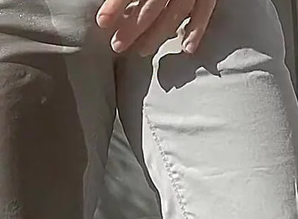 Jules Wets His Grey Pants and Exposes His Semi-hard Cock Through His Trousers