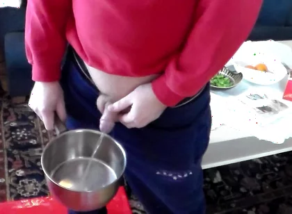 John Is Pissing Into a Kitchenpot