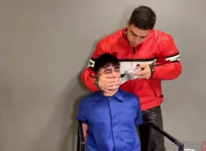 Bound leather biker cum