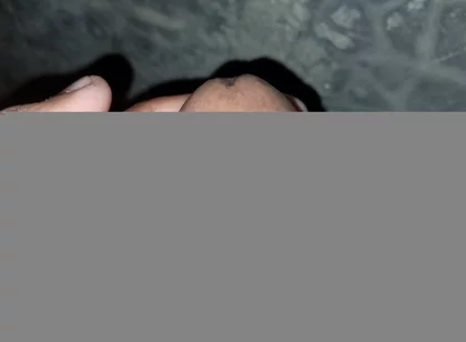 The Gay Boy Went to the Toilet, Turned on the Flash Light on His Mobile Phone, and Started Licking His Private Parts with Spit.