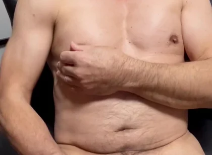 Masturbating