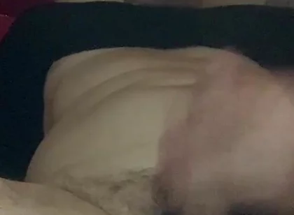 Masturbating