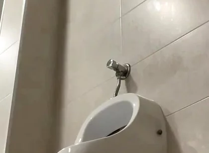 Amateur Twink Boy and Older Guy Caught Having Risky Fun in the Pool's Public Toilets