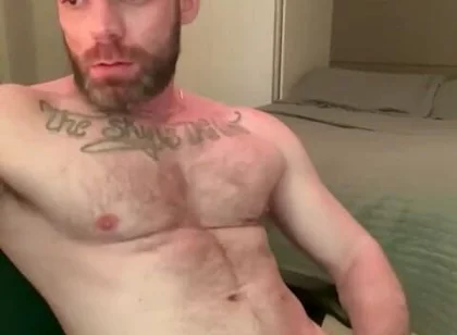 Masturbating