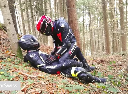 German dainese bikers having fun in the wood