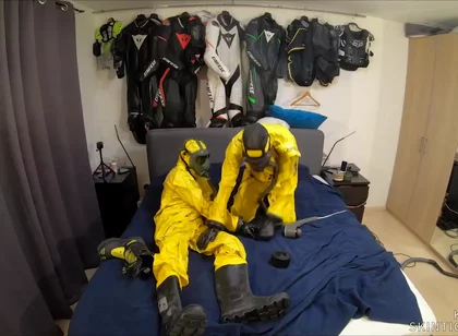 Vacuuming in tellchen hazmat suits