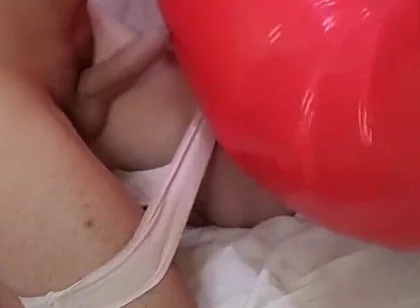 Playing with Red Swimring Pool Toy