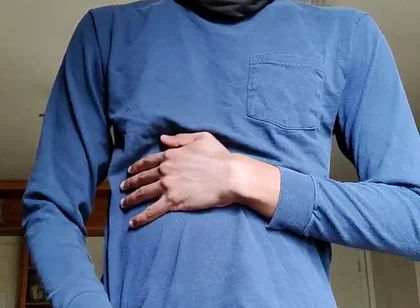 Masturbating