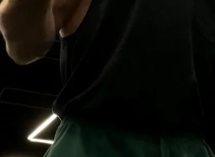 Doing a Biceps Curls with a Straight Barbell