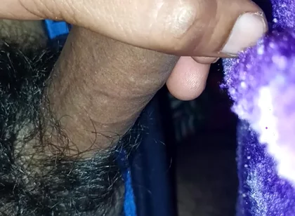 A Indian Young Boy Is Playing with His Penis Inside a Blanket