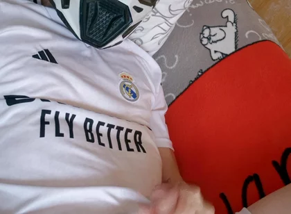 The Guy Is Wearing a Soccer Uniform and Mxhelmet with a Morning Cum