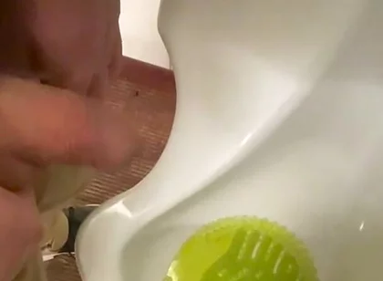 Amateur Redhead Guy Caught Pissing in a Public Toilet's Urinal - He Then Quickly Plays with His Cock Before Leaving
