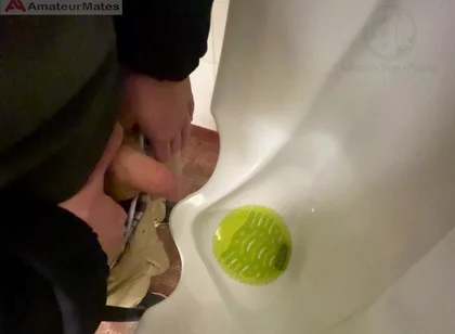 Amateur Redhead Guy Caught Pissing in a Public Toilet's Urinal - He Then Quickly Plays with His Cock Before Leaving