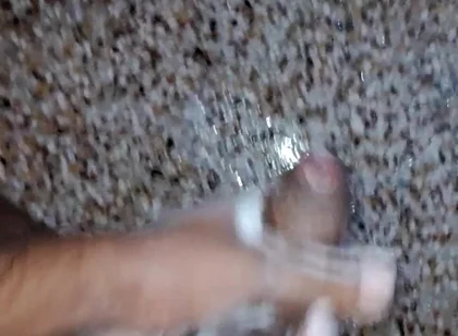 A Young Hindu Boy From India Is Fucking His Thick Cock Hard with His Hands While Taking a Bath