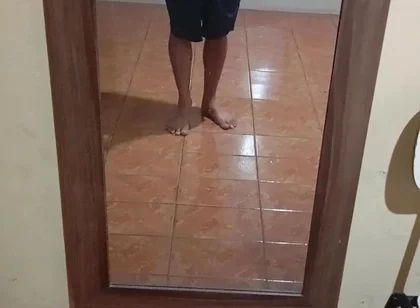 Boy in Shorts in the Mirror