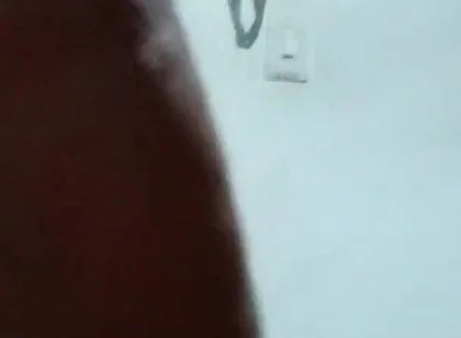Spilling milk while my neighbor stares out the window