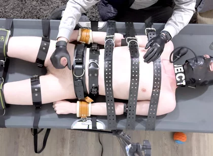 Rubber Twink Strapped Down and Made to Eat His Own Cum