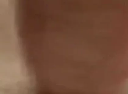 Masturbating
