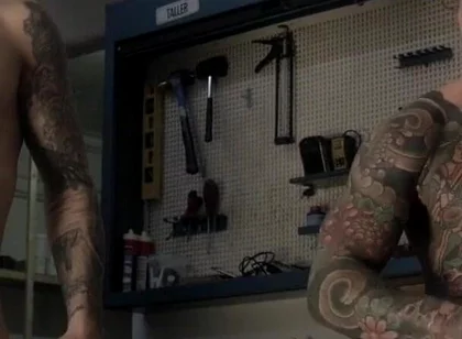 Two Friends in the Mechanic's Workshop