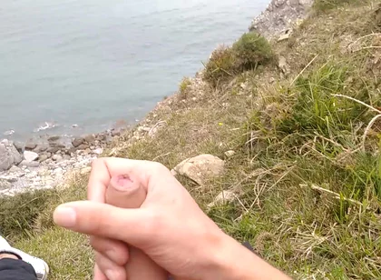 Big Beautiful Big Fat Cock Gets Handjob on the Beach with Gorgeous Sea Views