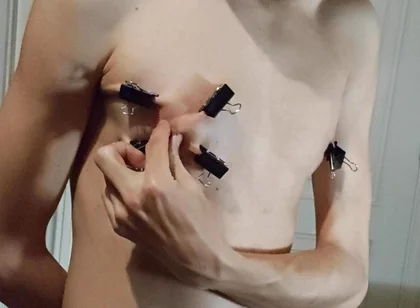 Twink Playing with Binder Clips