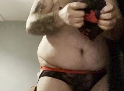 Anal Crossdressers Cuffed Cock and Ball with Pierced Nipples