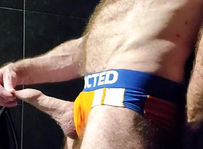 Muscle Bear Showing off His Uncut Cock