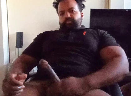 Thick Mixed Latino Bear Jacks off to Porn