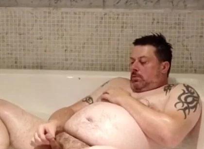 In the Big Bath Having a Wank