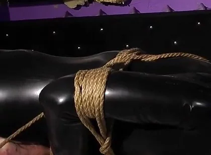Roped in Latex: Zeus Struggles to Break Free