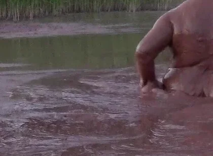 Mud Bath in Deep Quarry Mud Pond