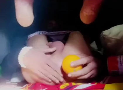 A Young Man Stuffs a Crystal Ball and an Orange up His Tight Ass.