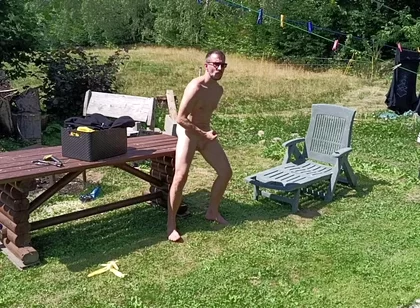 Jerking off While Hanging Out the Laundry