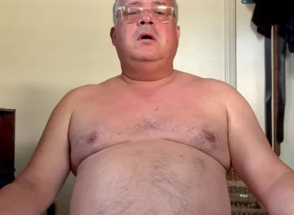 Old Man Nude in Bedroom