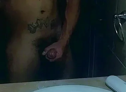 Masturbating