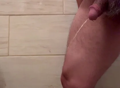 Man Pee in Bathroom