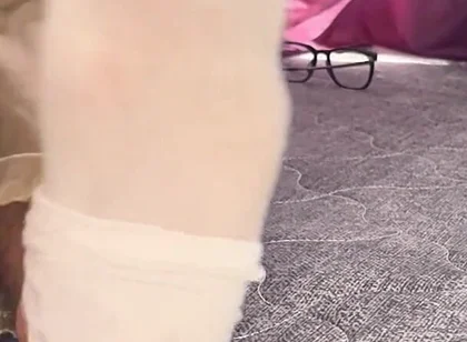 A University Rests Her Feet on Her Face so That the Adorers