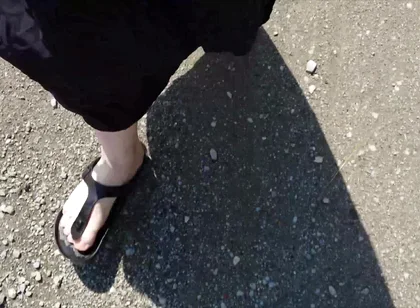 Outdoor in a Black Caftan and Barefoot in Black Birkenstocks
