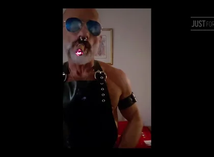Stepdad lighting his Cigar in rubber apron