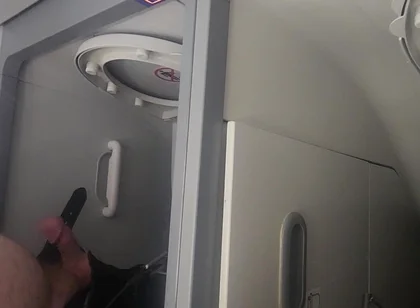 Airplane Bathroom Jerk and Cum.