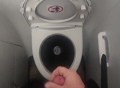 Airplane Bathroom Jerk and Cum.