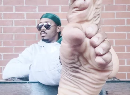I Expose My Feet and I Touch Them