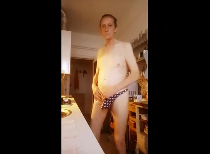 nude in kitchen with hammer in ass