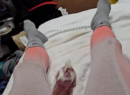 Edging in Condom and Finally Relese a Massive Load Inside!