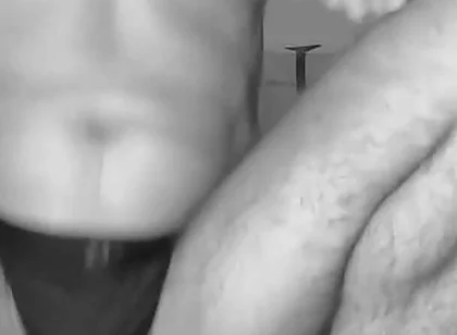 Man with Shaved Body Having Fun with His Toys